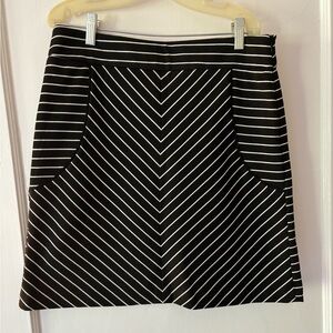 Sandro Studio Black skirt with patterned white strips, Size 6